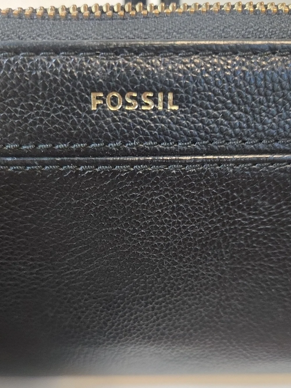 Fossil Black Leather Zip-Around Wallet with Gold Logo